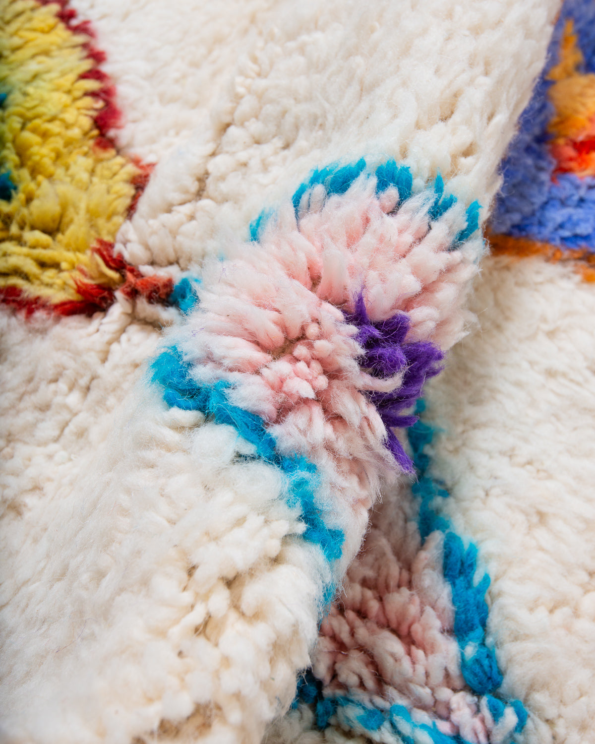Modern, designer, handcrafted Berber rug from Morocco. Beniourain carpet with beautiful colours and patterns and fluffy wool texture.